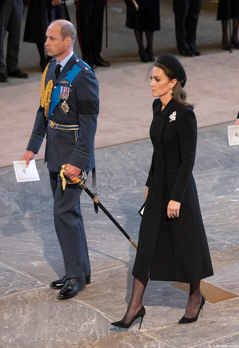 Kate Middleton wears pearls and a black veil to the procession