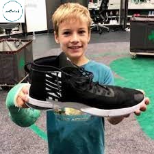 Tacko Fall shoe size comparison to an 8-Year-Old Boy